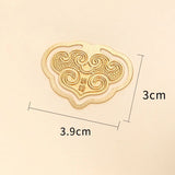Decorative shape of auspicious clouds-shaped object with measurements on a beige background