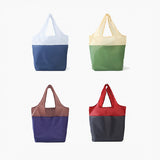 Four colorful tote bags on a white background