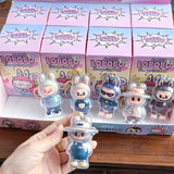 Set of LOBODO figures with packaging in the background
