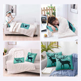 Custom 2-in-1 blanket and pillow set made from soft washed cotton, perfect for travel and corporate gifts.