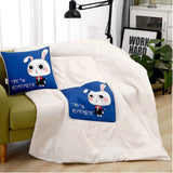 Custom 2-in-1 blanket and pillow set made from soft washed cotton, perfect for travel and corporate gifts.