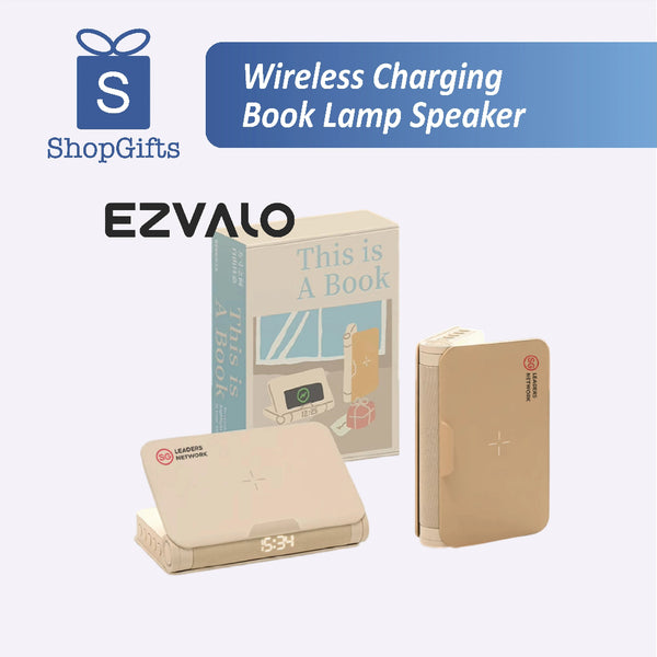 Book-shaped lamp speaker with wireless charging feature on desk