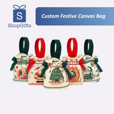 Set of custom festive canvas bags with Christmas designs on a white background, featuring ShopGifts logo.