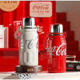 Sporty stainless steel vacuum bottle featuring the iconic Coca-Cola branding.
