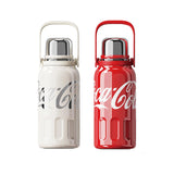 Sporty stainless steel vacuum bottle featuring the iconic Coca-Cola branding.