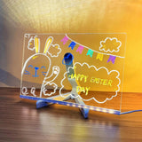 LED sign with Easter design on a wooden surface
