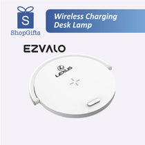 Sleek desk lamp with wireless charging pad at the base