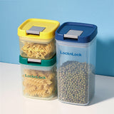 LocknLock storage containers with different colored lids on a white surface against a blue background