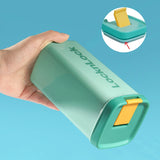 Hand holding a green and yellow container with a close-up inset on a blue background