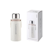 White thermos bottle with silver lid and 'LocknLock' branding, next to its packaging box on a white background.