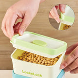 LocknLock food storage container with a lid being opened, filled with beans.