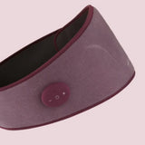 Purple Waist EMS Toning Belt with a control button on a light pink background