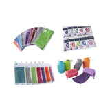 Collection of colorful cleaning pads and sponges on a white background