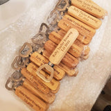 Wooden bottle openers with engraved text on a bubble-wrapped surface