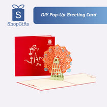 Red DIY pop-up greeting card with a Ferris wheel design, featuring the ShopGifts logo.