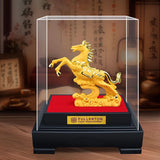 Gold horse statue in a clear display case on a red platform with 'Fullerton Fund Management' branding.