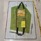 2-in-1 picnic mat bag unfolded on grass with picnic snacks_ corporate gift_customised gift singapore
