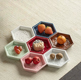 Hexagonal ceramic snack dishes with fruit and dessert 