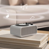 Minimalist EZVALO aroma diffuser and Bluetooth speaker in office setting