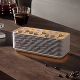 Compact wireless speaker with integrated ambient lighting feature