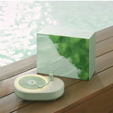 Minimalist aroma speaker combining scent, sound, and light