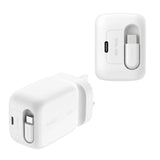 White Belkin 45W Dual USB-C GaN Wall Charger with retractable pins on a minimalist desk. _ Customised Corporate Gift