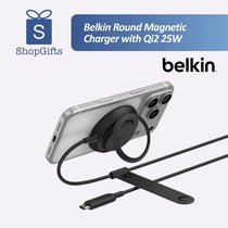Belkin BoostCharge Pro Qi2 Magnetic Wireless Charger in black with integrated kickstand on a minimalist desk. Customised Corporate Gift