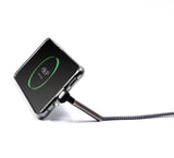 A phone that is charging with the Sample Trident Pro Eco