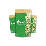 Three packages of Camel Green Peas on a white background