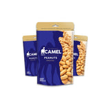 Three packages of Camel Peanuts on a white background