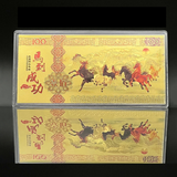 Two gold-colored banknote replicas with horse illustrations and red text on a reflective surface.
