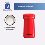 Red tumbler with ceramic inner container on a white background, featuring ShopGifts logo.