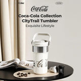Spill-resistant lid and durable stainless steel construction