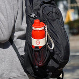 Sleek Coca-Cola-branded sports thermos cup with bold red and white logo design.