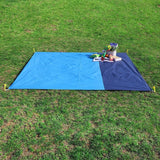 Oversized waterproof picnic mat with sea turtle design, ground stakes, and mesh carry bag for beach outings_ Corporate Gifts Singapore
