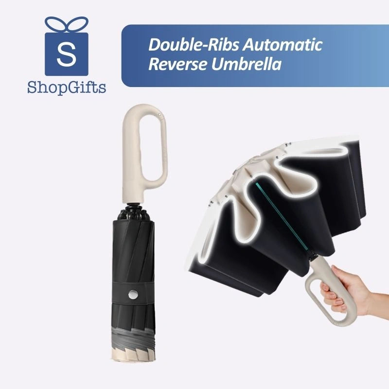 Executive Carabiner Automatic Reverse Umbrella in Matte Black with integrated clip handle on a minimalist pedestal _ corporate gifts