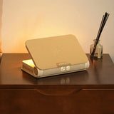 Multifunctional book-style light with speaker and charging dock