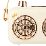 Retro microphone speaker with Bluetooth function on wooden desk