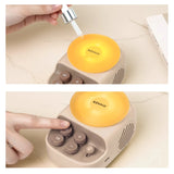 Multifunctional night light aroma diffuser speaker on bedside table

