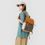 Everyday Colour Block Drawstring Backpack in orange, brown and cream, worn over the shoulder_corproate gift
