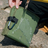 Olive green waterproof folding outdoor seat cushion with black carabiner clip for hiking and camping_customised corporate gifts singapore