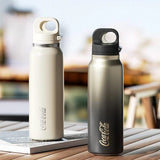 Coca-Cola Collection To The Wild Athletic Vacuum Bottle in sleek black and red design, ideal for outdoor use and corporate gifting.