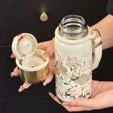 Mini sport vacuum bottle with integrated cup and Van Gogh design, perfect for elegant and functional corporate gifts.