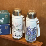 Mini sport vacuum bottle with integrated cup and Van Gogh design, perfect for elegant and functional corporate gifts.
