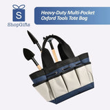 Blue and beige Heavy-Duty Multi-Pocket Oxford Tool Tote with black handles and multiple exterior pockets for garden tools. Gift Shop