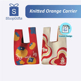 Knitted Orange Carrier