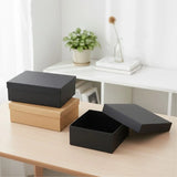 Two-piece Kraft Paper Lid and Base Boxes in natural brown and matte black finishes, showcasing a premium telescopic design for corporate gift packaging.