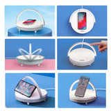 Multifunctional device with smartphone holder and wireless charger on a blue background