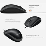 Logitech B100 corded USB mouse being used on a gray felt desk mat next to a laptop, a reliable tech essential for corporate gifting._customised corporate gift singapore