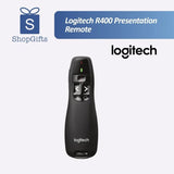 An Asian professional using the ergonomic Logitech R400 clicker to seamlessly present design concepts to her team in a collaborative workplace._Customised Premium Corporate Gift